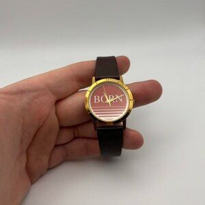 Retro men’s “Born” watch with silver tone and adjustable brown leather strap!